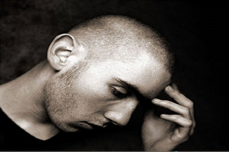 Young man holding his head in his hand.  He is melancholy.
https://upload.wikimedia.org/wikipedia/commons/2/2c/Melancholy_2.PNG